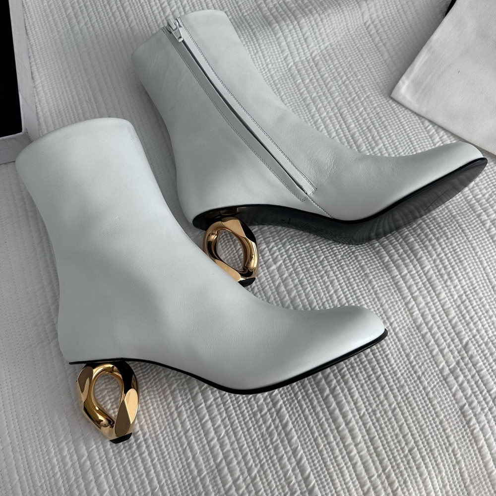 JW ANDERSON White Heeled Boots with iconic Gold Detail.